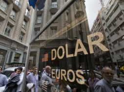 Banco Base BASE prevé que el tipo de cambio se cotice entre 19.22 y 19.35 pesos por dólar. AP / ARCHIVO