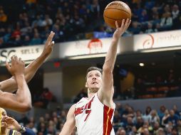 Figura. Goran Dragic (#7) lideró la ofensiva del Heat con 20 puntos ayer contra Indiana. AFP