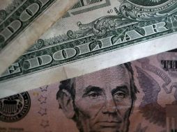 Banco Base prevé que el tipo de cambio se cotice entre 19.30 y 19.50 pesos por dólar. AFP / ARCHIVO