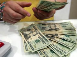 De acuerdo con el Banco de México, el tipo de cambio del billete estadounidense se fijó en 19.3433 pesos. EL INFORMADOR / ARCHIVO