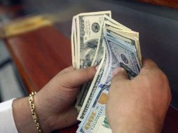 Para este viernes se prevé que el tipo de cambio se ubique entre 19.05 y 19.25 pesos por dólar en cotizaciones interbancarias a la venta. EL INFORMADOR / ARCHIVO