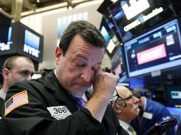 Los operadores en el parqué neoyorquino protagonizaron una sesión de gran volatilidad. AP / ARCHIVO