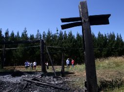En la madrugada del martes, tres iglesias católicas fueron blanco de ataques incendiarios. AFP/C. Reyes