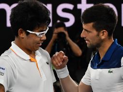 Definitivamente es un jugador que aspira a estar entre los mejores 10: Djokovic. AFP / P. Crock