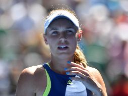 Wozniacki conocerá el nombre de su rival tras el partido entre la rumana Simona Halep y la alemana Angelique Kerber. AFP/S. Khan