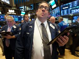 Wall Street terminó mixco gracias a una serie de avances ligados a una nueva jornada en la tanda de resultados trimestrales. AP / R. Drew