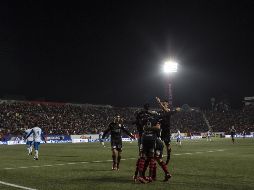 Gustavo Bou y Juan Lucero hicieron los goles del partido. AFP/G. Arias