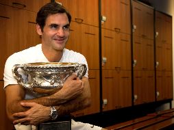 Federer gana por segundo año consecutivo el Abierto de Australia en cinco sets., ante el croata Cilic. AFP / F. Hamilton