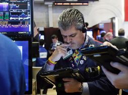 El Dow Jones de Industriales perdió 180.06 puntos, hasta 26 mil 436.65 enteros. AP / R. Drew