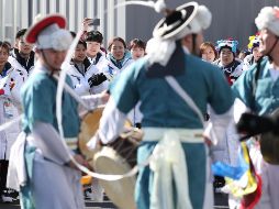 Aunque al principio en ambiente fue un poco tenso, todo terminó bien en un evento donde los deportistas convivieron amistosamente. NTX/YONHAP