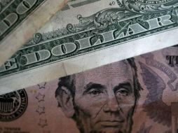 Banco Base prevé que el tipo de cambio se ubique entre 18.55 y 18.80 pesos. AFP / ARCHIVO