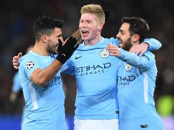 Agüero (I) De Bruyne (D) y Silva (D) celebran el triunfo de los Citizens. AFP/S. Bozon