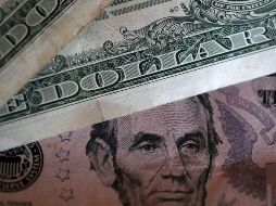 El tipo de cambio es de 18.5159 pesos según el Banco de México. AFP / ARCHIVO