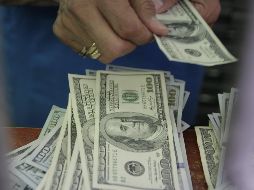 De acuerdo con el Banxico el tipo de cambio es de 18.4997 pesos. NTX / ARCHIVO