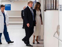 El mandatario y su esposa Melania llegaron a esta zona del norte de Miami al final de un día difícil para las familias víctimas del tiroteo. AFP / J. Watson