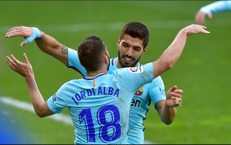 Los goles de Luis Suárez al minuto 16 y Jordi Alba al 88 fueron suficientes para sumar un triunfo que los afianza en la cima general de la competencia. AFP / A. Gillenea