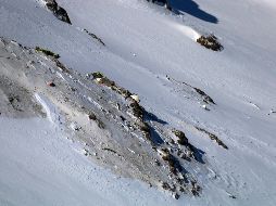 El escarpado terreno del lugar del accidente del avión de Aseman va a complicar la evacuación de los cuerpos. AP/M. Khademosheikh