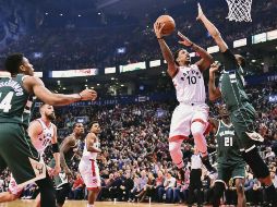 Líderes. DeMar DeRozan (#10) encabeza el buen paso de los Raptors en el Este. AP