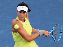 Garbiñe dominó el primer set y se lo llevó tras quebrar el saque de su rival en el sexto game, que le dio ventaja de 4-2. EFE / M. Khaled