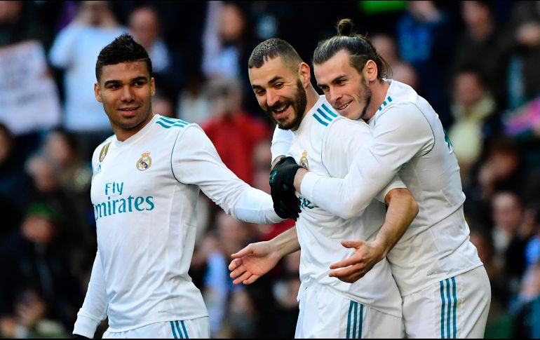El encuentro quedó sentenciado en el primer minuto de la reanudación, cuando Benzema dio el pase de gol a Bale, que definió en carrera de zurda. AFP / P. P. Marcou