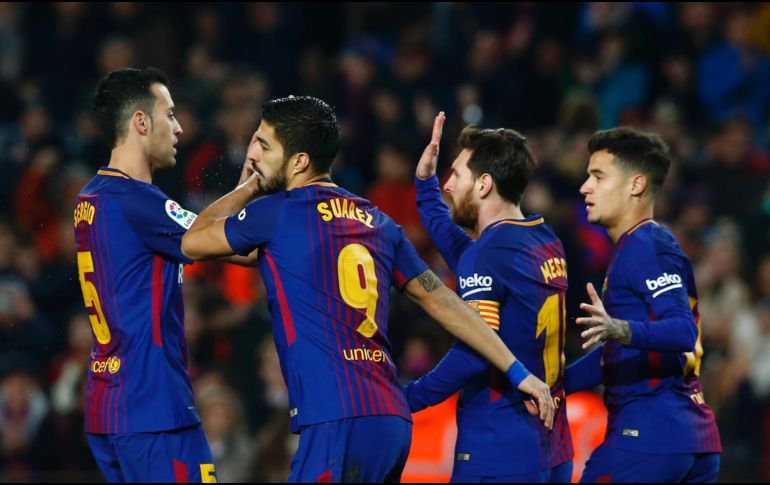 Con Messi como máximo referente, el Barcelona marcha en primer lugar de la Liga española. AP/M. Fernández