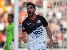 Facundo Erpen celebra tras abrir la cuenta de los Lobos. MEXSPORT/ISABEL