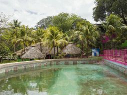 Las aguas termales, en un ambiente que parece sacado del paraíso. EFE