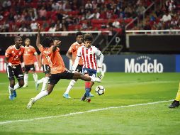 El tercero. El canterano José Juan Macías (#18) firmó el 3-0, cuando ya se dibujaba la goleada rojiblanca sobre el Cibao dominicano. EL INFORMADOR/F. Atilano