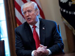 El mandatario impondrá el gravamen o cuotas sobre las importaciones ''la próxima semana'' a fin de estimular la manufactura estadounidense. AFP / M. Ngan