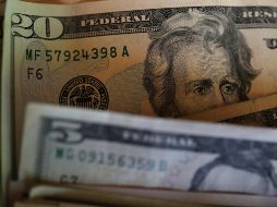 El tipo de cambio es de 18.8909 pesos, de acuerdo con el Banco de México. AP / ARCHIVO