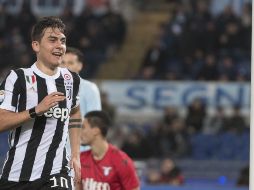 Al argentino Paulo Dybala celebra su tanto, al minuto 93 del partido contra la Lazio. EFE/M. Brambatti