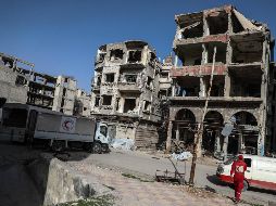 El convoy estaba compuesto por 46 camiones que transportaban comida y material de asistencia médica. EFE/M. Badra