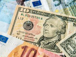 Banco Base prevé que el tipo de cambio cotice entre 18.60 y 18.85 pesos por dólar en cotizaciones interbancarias a la venta. AFP / ARCHIVO