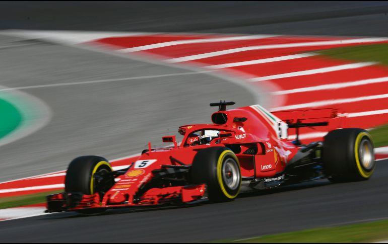 Sebastian Vettel. El piloto alemán de Ferrari rodó 171 vueltas ayer durante el quinto día de prácticas en Barcelona. AFP