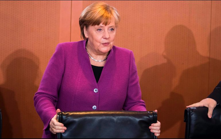 Merkel, vestida con una chaqueta morada y una camiseta negra, se unió a las conmemoraciones de hoy. AFP/O. Andersen