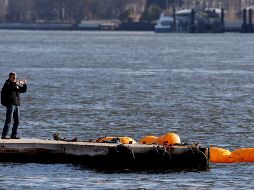 Los arneses de seguridad pudieron haber obstaculizado el escape de los pasajeros que no lograron ser rescatados. EFE/J. Lane