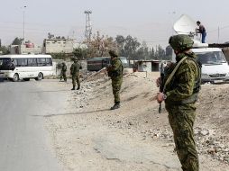 Tras la salida de los evacuados, el Ejército sirio entró en Al Qadam y tomó el control de los puntos que estaban en manos de los combatientes. AFP/L. Beshara