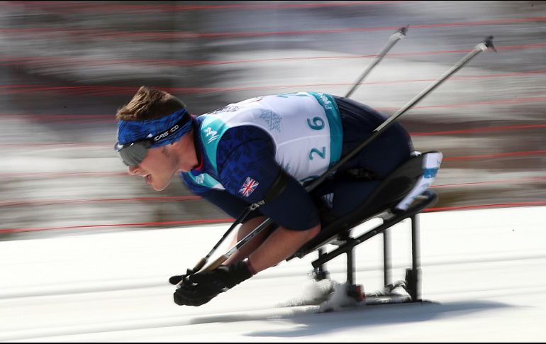 El británico Scott Meenagh compite en una prueba de biatlón, en el marco de los Juegos Paralímpicos de Invierno en Pyeongchang, Corea del Sur. AP/N. Han Guan