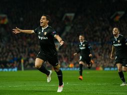 Ben Yedder celebra uno de sus dos goles, que le dan la victoria al Sevilla. EFE/P. Powell