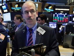 El principal indicador de bolsa neoyorquina, descendió a 24 mil 758.12 puntos, de manera paralela a los índices del Nasdaq y el S&P 500. AP/ R. Drew