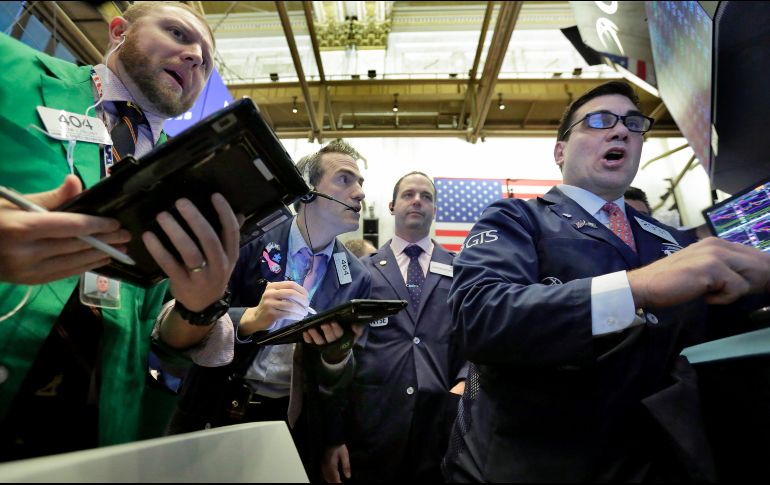 El Dow Jones subió 0.47 por ciento terminó en 24 mil 873.66 puntos. AP / ARCHIVO