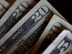 El tipo de cambio es de 18.7216 pesos para este viernes, según el Banco de México. AFP / ARCHIVO