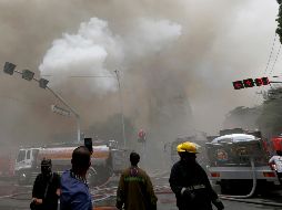 Autoridades abrieron una investigación para esclarecer las causas del incendio en el Waterfront Manila Pavilion Hotel & Casino. AP/B. Marquez