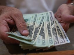 El tipo de cambio para solventar operaciones denominadas en moneda extranjera en el país se ubica en 18.7614 pesos. EL INFORMADOR / ARCHIVO