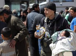 Informan que más de 110 camiones con seis mil personas abandonaron en las últimas horas Guta Oriental. AFP/O. Haj-Kadour