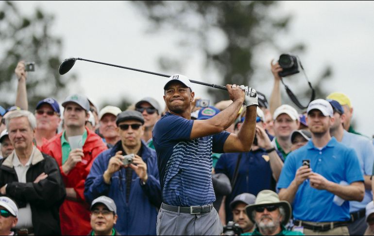 Gran parte de los asistentes al campo del Augusta National tendrán sus ojos puestos sobre Tiger Woods, que busca su primer gran triunfo desde 2008. AP/D. Phillip