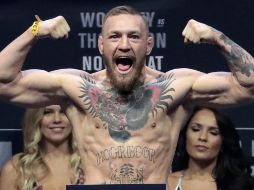 McGregor rompíó uno de los cristales del autobús que atacó al lanzarle una silla. AP / ARCHIVO