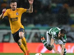 La primera parte fue un suplicio para el Atlético, que estuvo arrinconado en su área. AFP/F. Leong