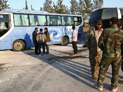 El control de las fuerzas sirias y rusas sobre Guta se produce tras la salida del último convoy de decenas de autobuses con miles de combatientes islamistas. AFP/N. Al-Khatib