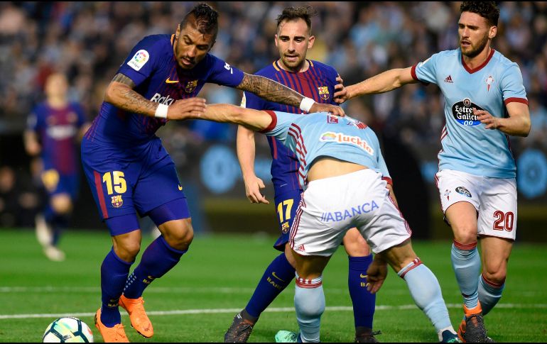 Los catalanes jugaron con diez hombres desde el minuto 71 por la expulsión de Sergi Roberto. AFP/M. Riopa